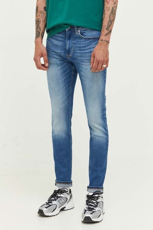 Джинсы с эффектом потертости Tommy Jeans