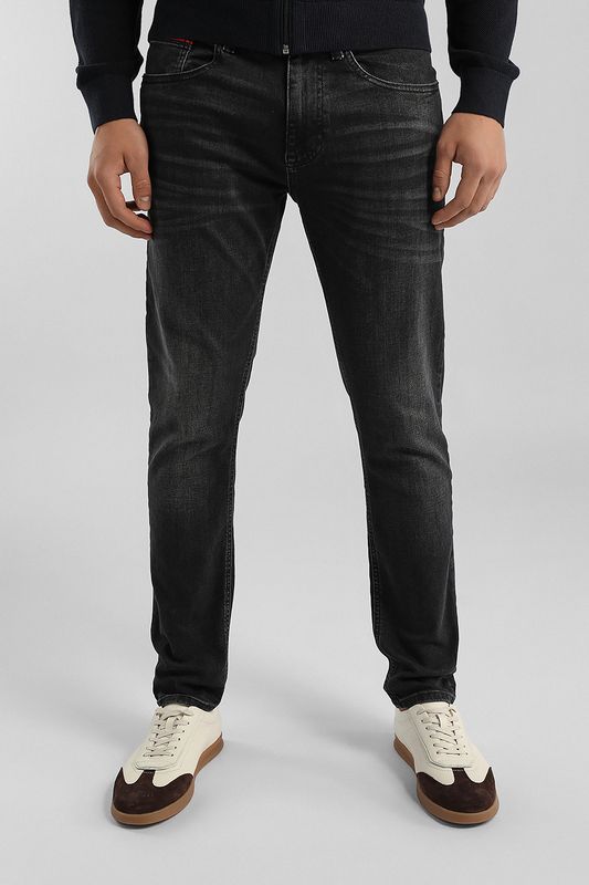 Джинсы с эффектом потертости Tommy Jeans
